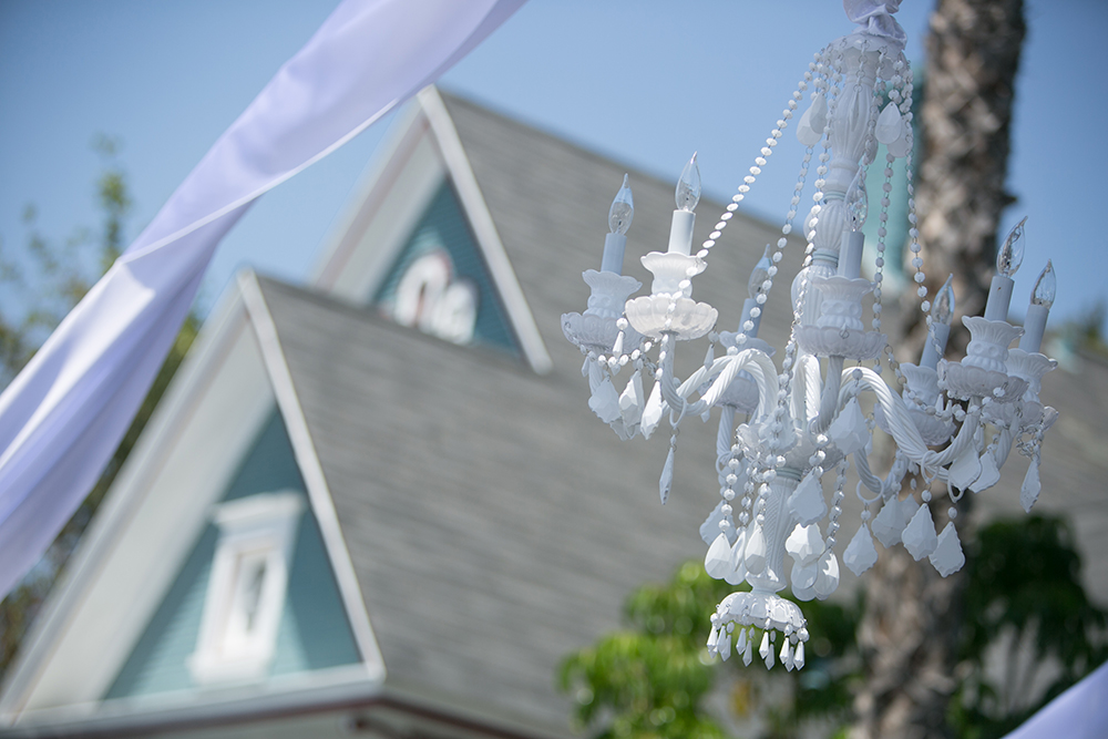 White chandelier wedding rentals